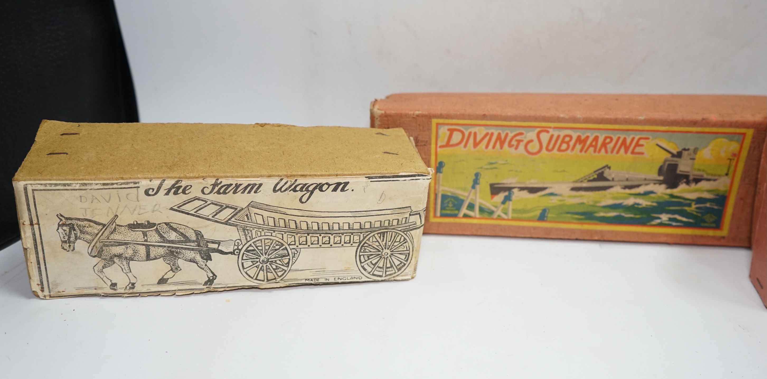 Three boxed 1930s toys; a Johillco Miniature Stage Coach, a Charbens (Set; 503) The Farm Wagon, and a CK, Japan, Diving Submarine in grey-blue finish with Union flag and friction drive motor. Condition - fair to good.